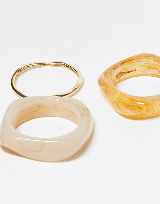 ASOS DESIGN pack of 3 bangles in mixed resin and gold tone