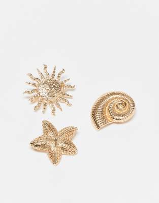 pack of 3 brooches in sun, shell and starfish design in gold tone