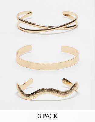 ASOS DESIGN ASOS DESIGN pack of 3 cuff bracelets with mixed design in gold tone
