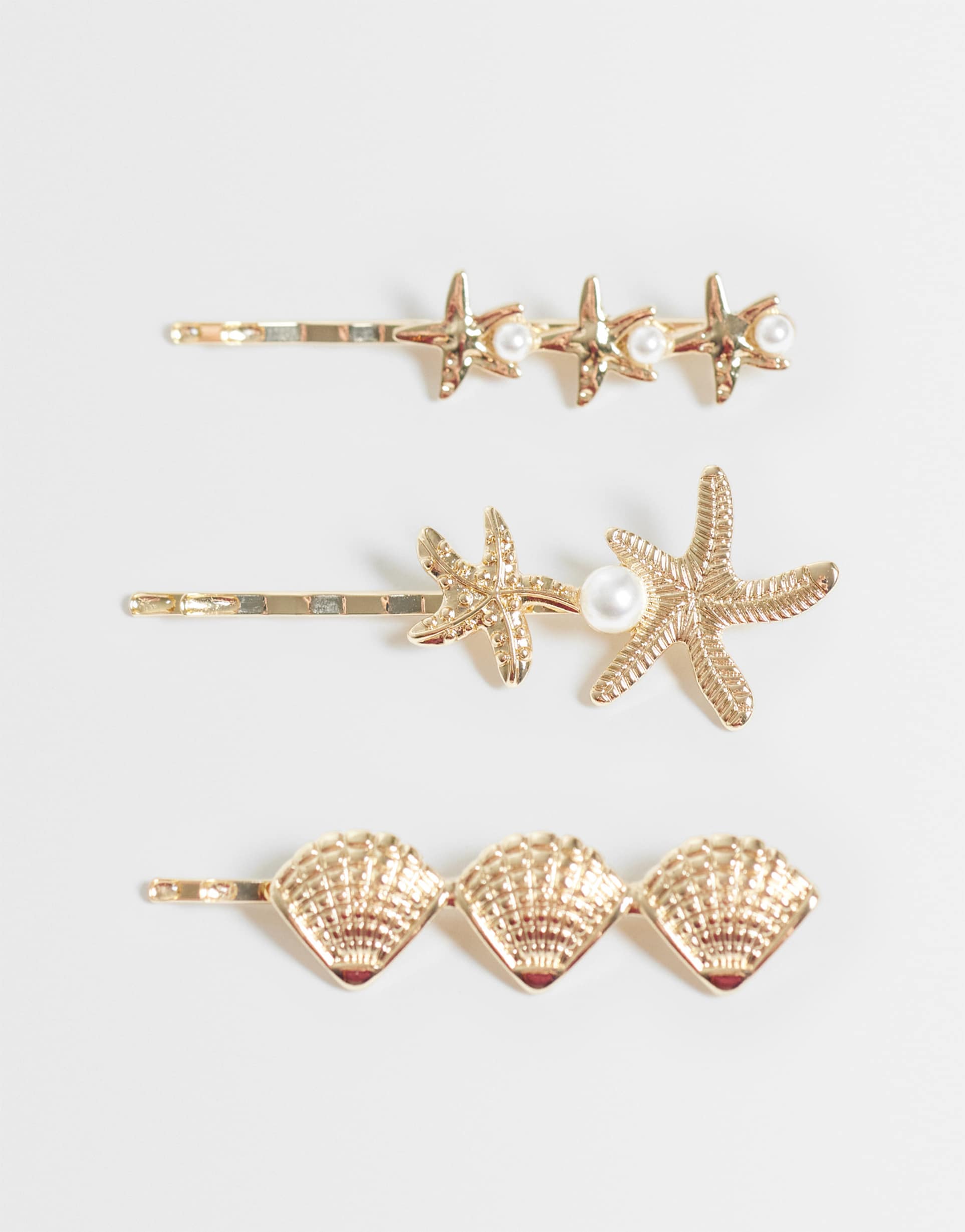 asos design pack of 3 hair clips with mixed sea-life design in gold tone
