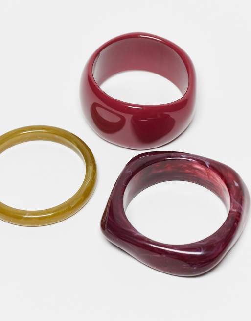 ASOS DESIGN pack of 3 mixed shape bangles in multi-colored resin