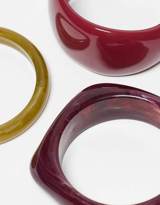 ASOS DESIGN pack of 3 mixed shape bangles in multi-colored resin