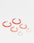 [ASOS DESIGN] ASOS DESIGN pack of 3 resin hoops in graduating sizes in peachy pink tones No Size Pink Mix