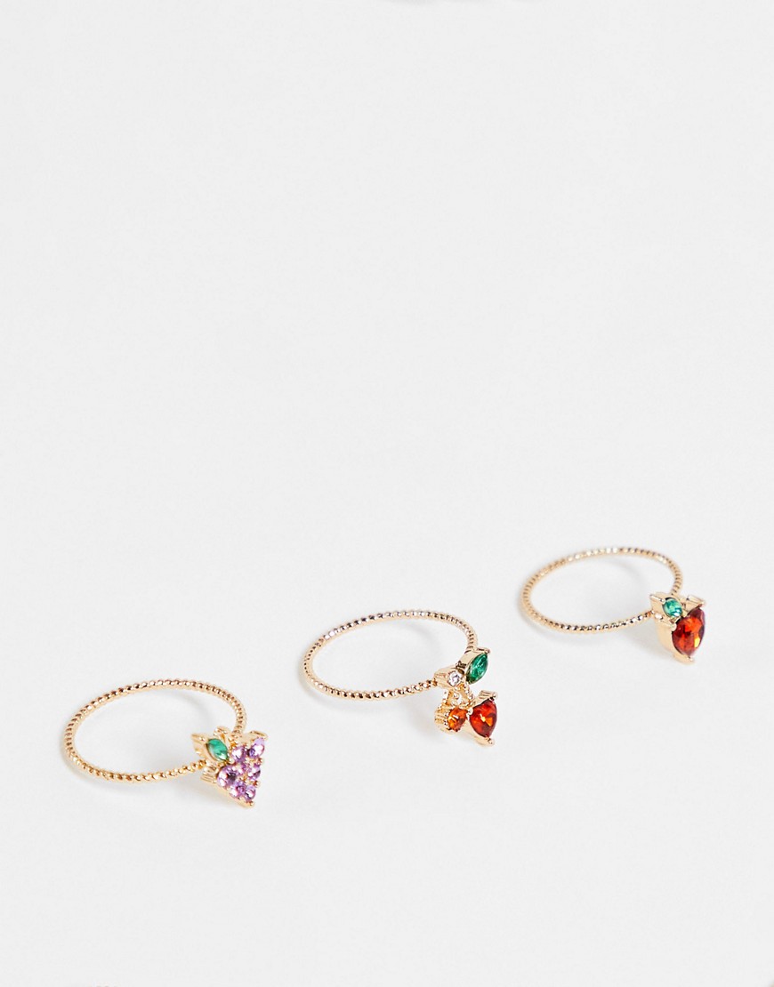 ASOS DESIGN pack of 3 rings in crystal fruit design in gold tone