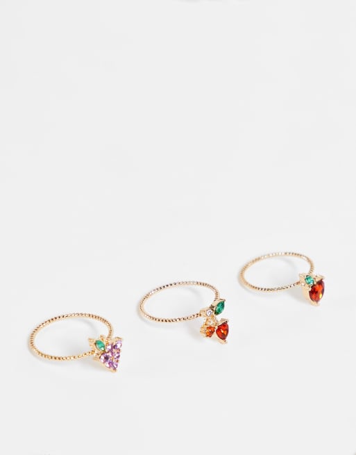 ASOS DESIGN pack of 3 rings in crystal fruit design in gold tone