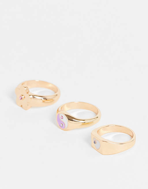 ASOS DESIGN pack of 3 rings in mixed playful designs in gold tone