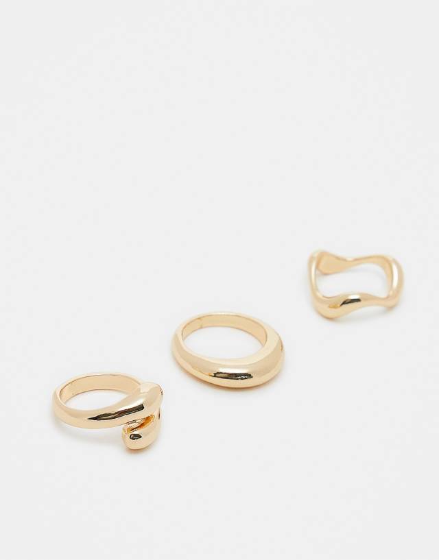 ASOS DESIGN pack of 3 rings with mixed minimal designs in gold tone