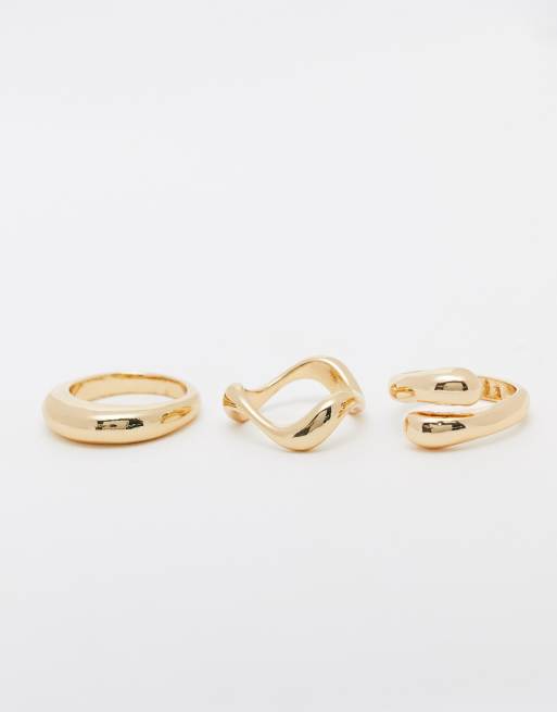 ASOS DESIGN pack of 3 rings with mixed minimal designs in gold tone, 3 of 4