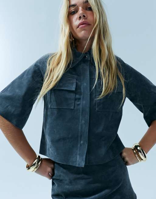 ASOS DESIGN pack of 4 bangle bracelets in mixed design in gold tone