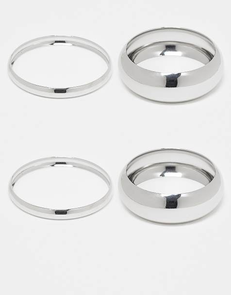 ASOS DESIGN pack of 4 bangle bracelets in mixed design in silver - view 1