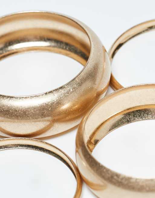 ASOS DESIGN pack of 4 bangles in brushed gold tone