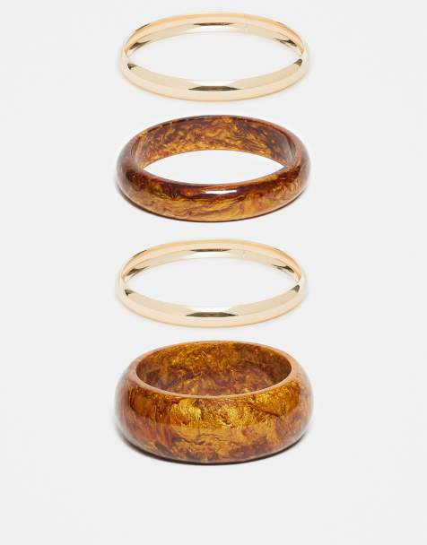 ASOS DESIGN pack of 4 bangles in ombre brown and bangles in gold tone - view 1