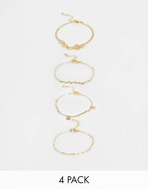 ASOS DESIGN pack of 4 bracelets with snake and disk charms in gold tone