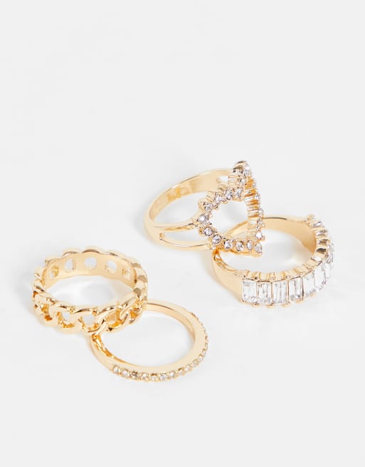 ASOS DESIGN pack of 4 glam rings with crystal design in gold tone | ASOS