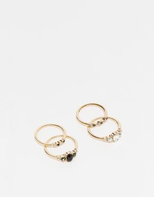 pack of 4 mini rings with multi crystals in gold tone