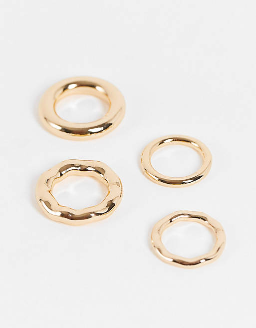 ASOS DESIGN pack of 4 rings in tube design in gold tone