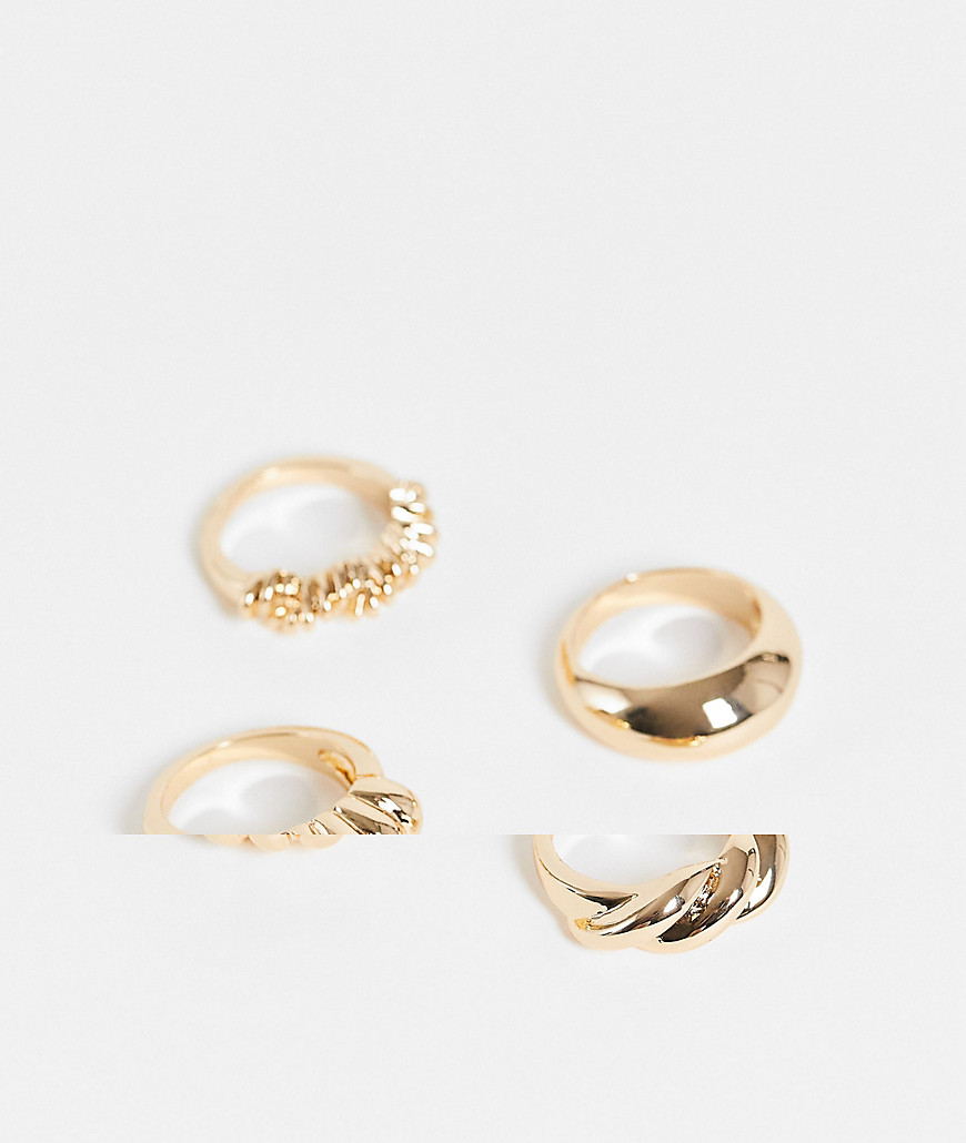 ASOS DESIGN pack of 4 rings in twist design in gold tone