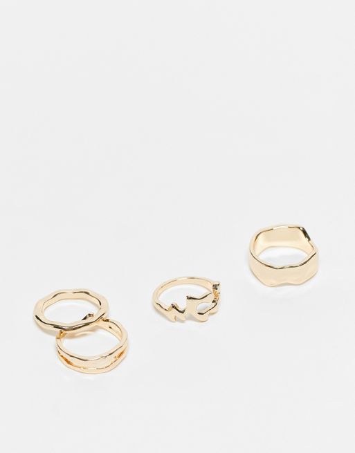  ASOS DESIGN pack of 4 rings with molten design in gold tone