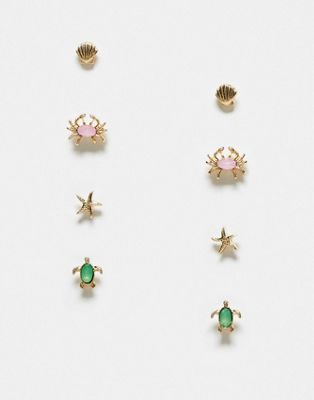 ASOS DESIGN pack of 4 stud earrings in sealife design in gold tone | ASOS