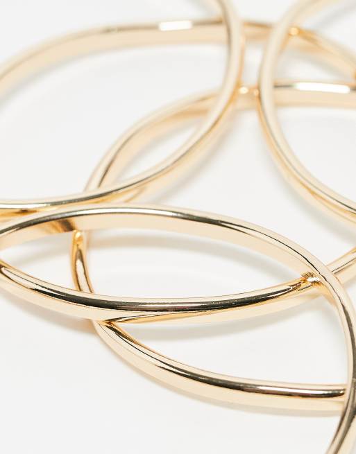 ASOS DESIGN pack of 5 bangles with abstract wave detail in gold tone, 2 of 3