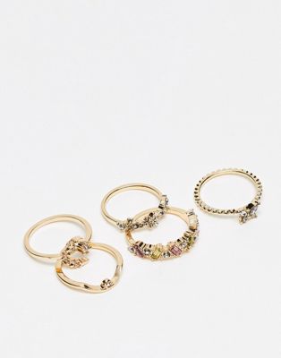 ASOS DESIGN pack of 5 rings with delicate crystal design in gold tone