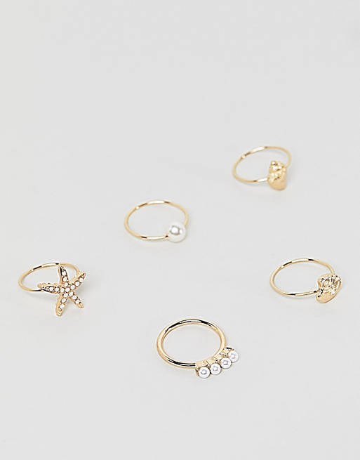 ASOS DESIGN pack of 5 rings with pearl and diamante detail in gold