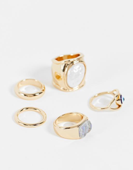 ASOS DESIGN pack of 5 rings with pearl and eye in gold tone