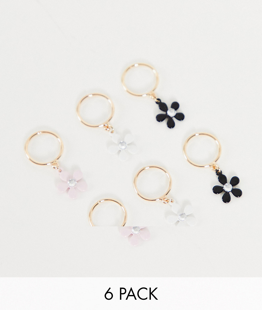 ASOS DESIGN pack of 6 hair rings in gold with daisy design