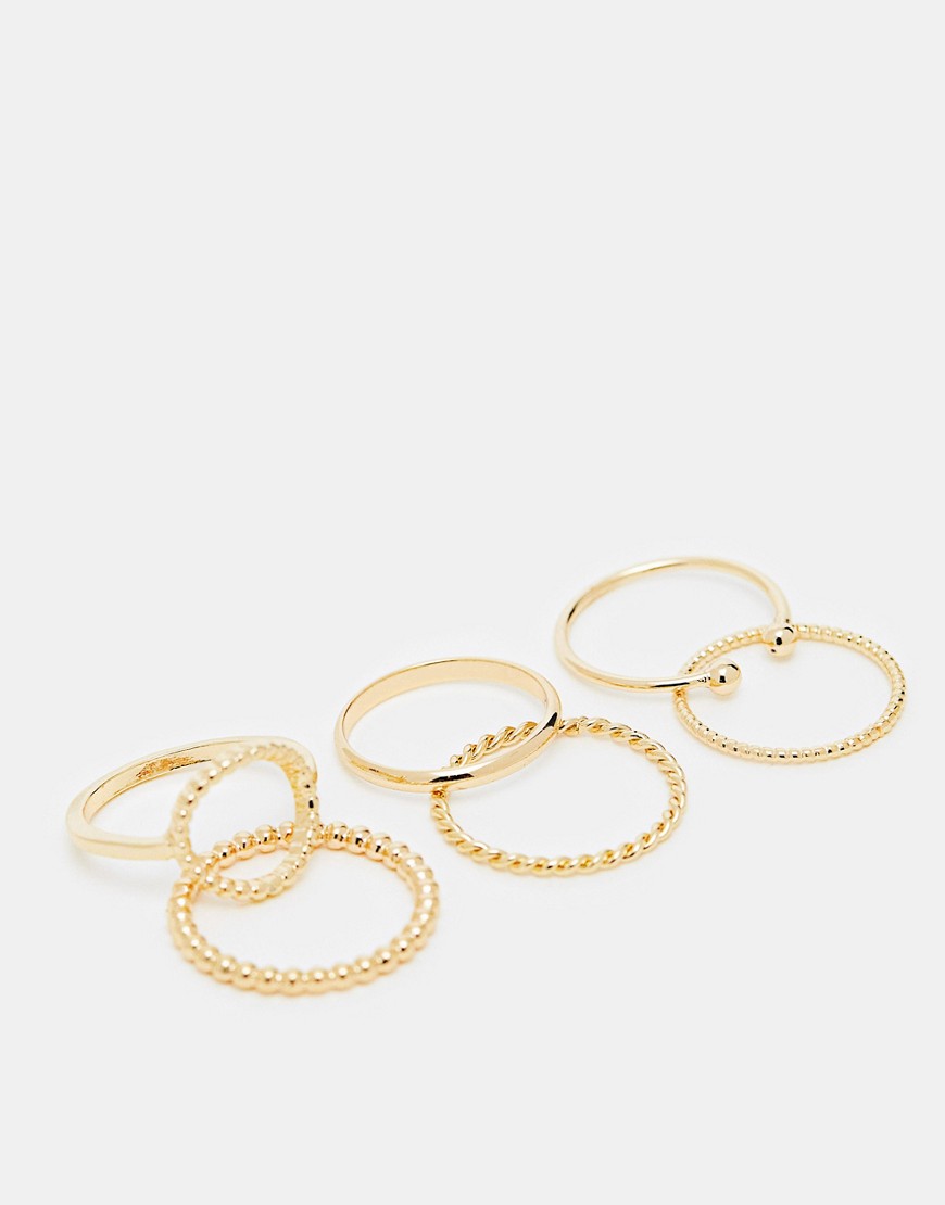 ASOS DESIGN pack of 6 rings with open circle detail in gold tone