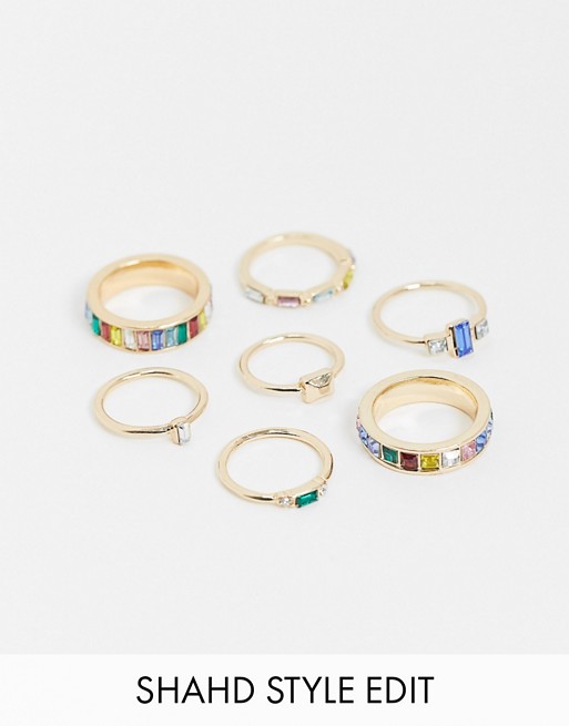 ASOS DESIGN pack of 7 rings with multi-coloured stone design in gold tone