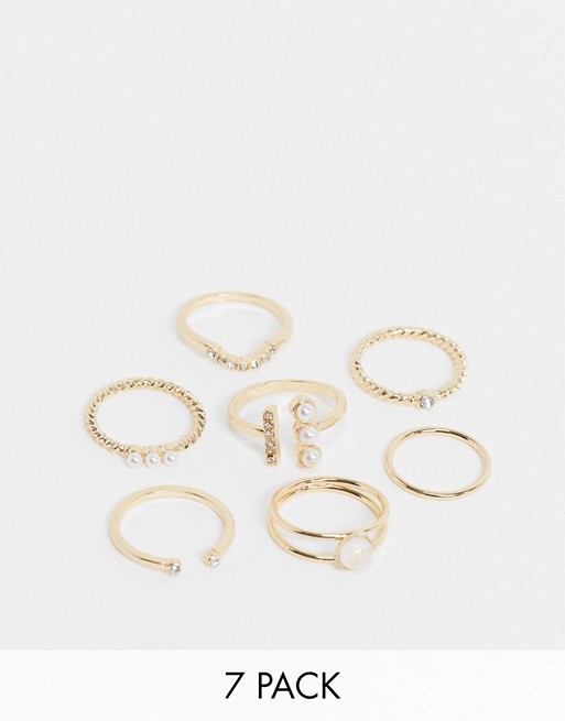ASOS DESIGN pack of 7 rings with pearl detail in gold tone
