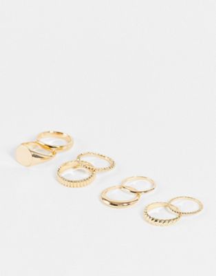 ASOS DESIGN pack of 8 rings with mixed minimal designs in gold tone