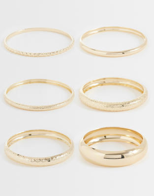 Asos Design Pack Of Mixed Stacking Bangles In Gold