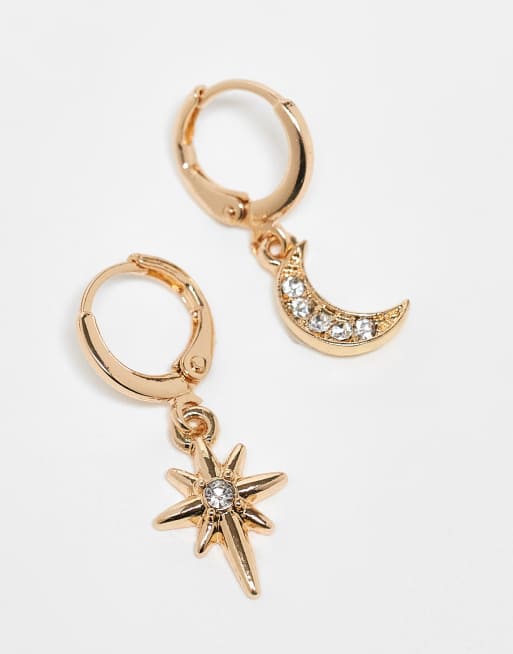 ASOS DESIGN pack of two huggie hoop earrings with celestial charms in gold tone