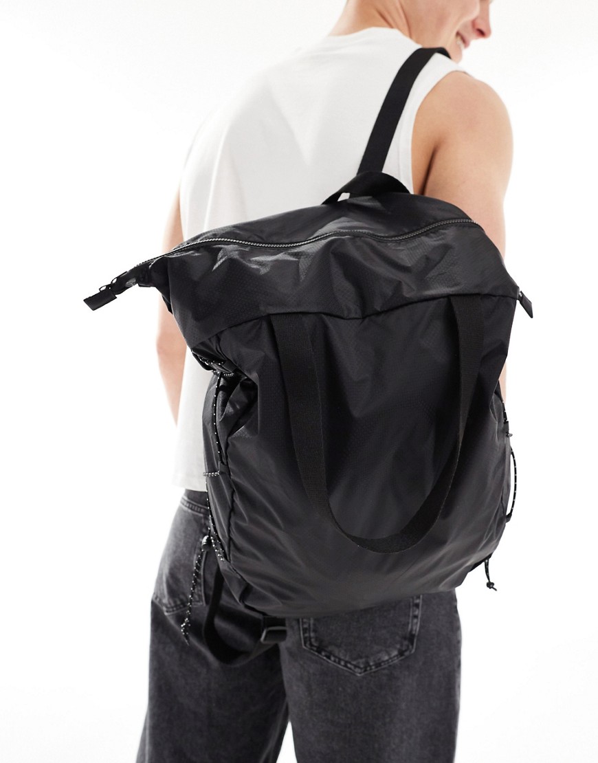 ASOS DESIGN packable backpack and tote bag with cord ties in black