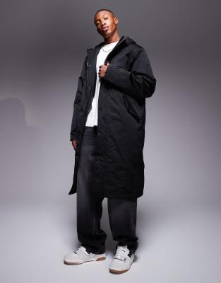 padded longline parka jacket in black