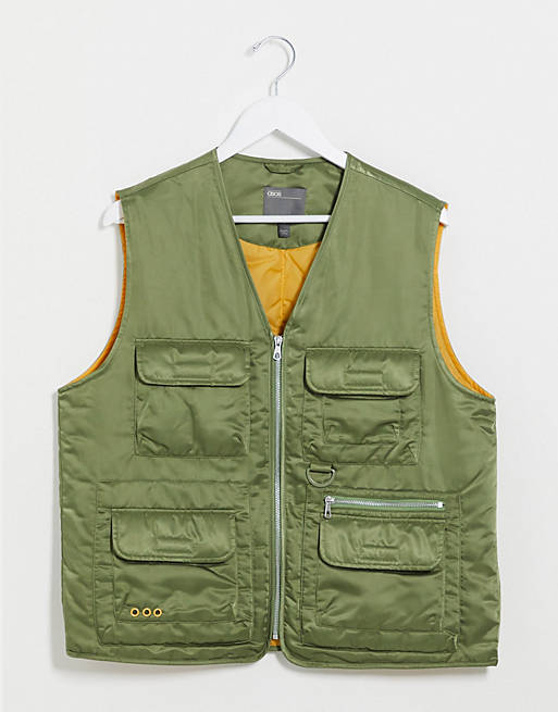 ASOS DESIGN padded utility vest in green with orange lining | ASOS
