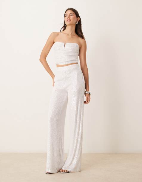 ASOS DESIGN – Pailletten-Set in Weiß mit gerafftem, trägerlosem Oberteil und Hose mit weitem Bein - view 1