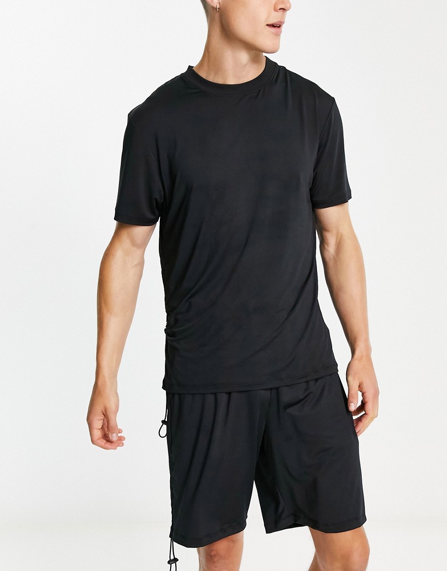 ASOS DESIGN pajama lounge set with t-shirt and shorts in black with gather detail