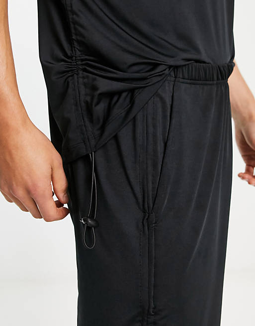 ASOS DESIGN pajama set with t-shirt and pants in black with fleece
