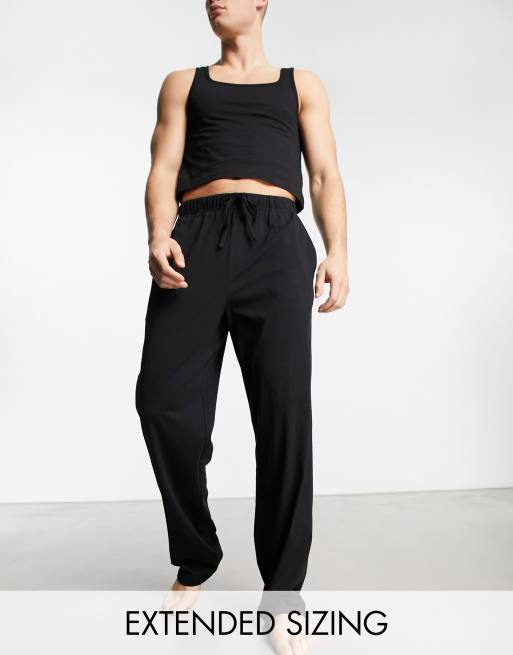 ASOS DESIGN pajama set with t-shirt and pants in black with fleece