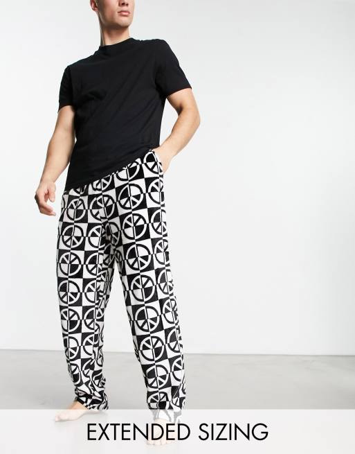 ASOS DESIGN pajama set with t-shirt and pants in black with fleece