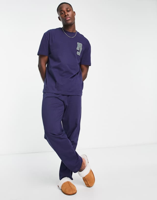 ASOS DESIGN pajama set with t-shirt and pants in navy with embroidery