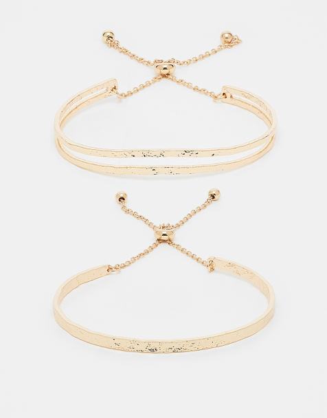 ASOS DESIGN - Pakke med 2 guldfarvede vennearmbånd med snøredetalje - view 1