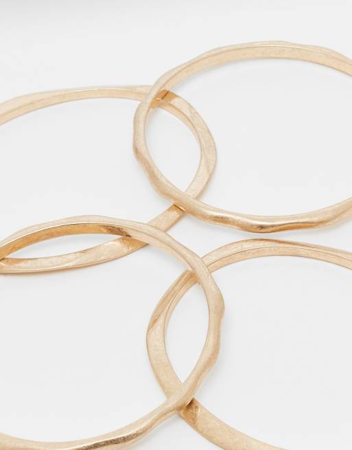 ASOS DESIGN - Pakke med 4 armbånd med smeltet design i børstet guld, 3 af 3