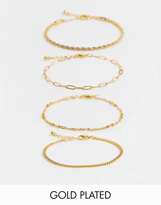 ASOS DESIGN - Pakke med 4 armbånd med tynde kæder i 14k guldbelægning