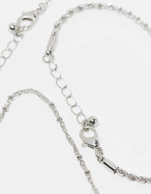 ASOS DESIGN - Pakke med 4 guldfarvede armbånd med smalle kæder, 3 af 3