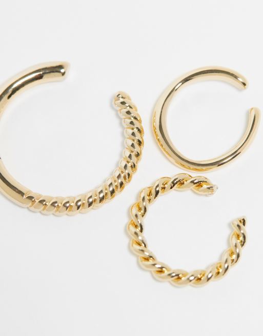 ASOS DESIGN - Pakke med 5 par guldfarvede ørecuffs med forskellige detaljer, 2 af 4