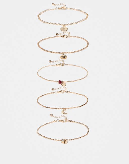 ASOS DESIGN - Pakke med guldfarvede armbånd med tynde kæder og vedhængsdetaljer