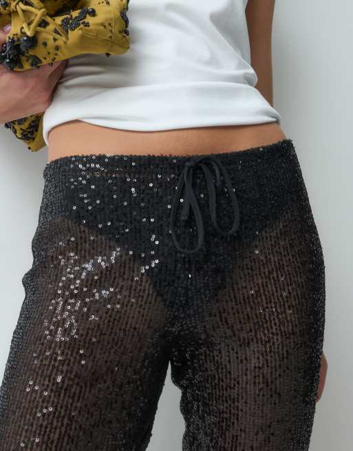 ASOS DESIGN paljettbyxor med vida ben i svart, 2 av 5